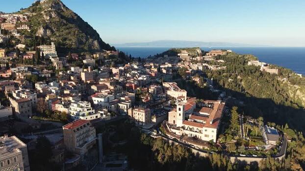 Aerial view of the historic hillside town of Taormina Italy.