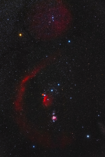 View of the Orion constellation featuring the Orion Nebula the Horsehead Nebula and the glowing arc of Barnard s Loop against the night sky in Poland. View of the Orion constellation featuring the Orion Nebula the Horsehead Nebula and the glowing arc of Barnard s Loop against the night sky in Poland.
