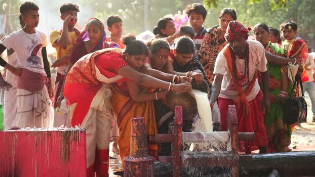 View of people performing a traditional milk ritual Bangladesh. View of people performing a traditional milk ritual Bangladesh.