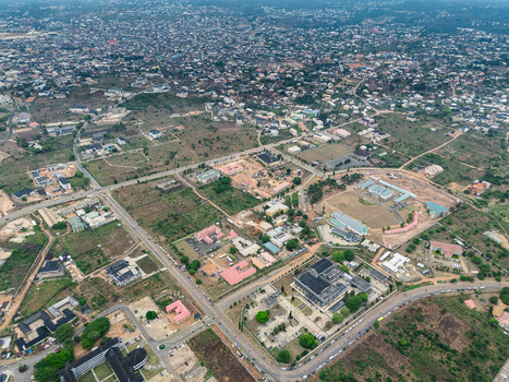 Aerial view of densely populated Ihie Ndume where buildings intermingle with patches of green creating a vibrant mosaic of urban life Umuahia Abia Nigeria. Aerial view of densely populated Ihie Ndume where buildings intermingle with patches of green creating a vibrant mosaic of urban life Umuahia Abia Nigeria.