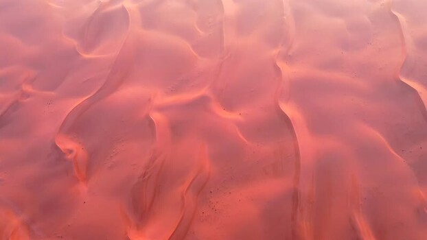 Aerial view of red sand dunes in Neom Saudi Arabia.