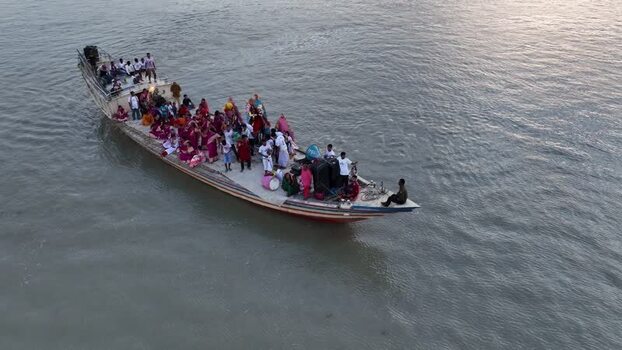 Aerial view of a crowded boat on the river Bangladesh.