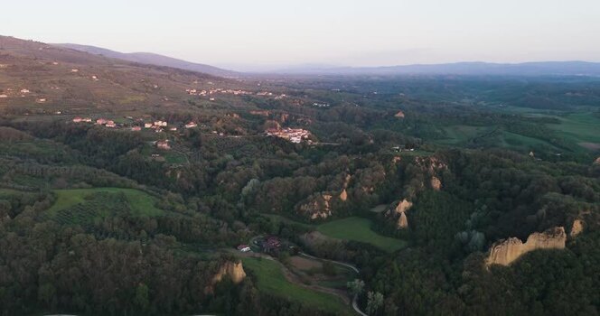 Aerial view of Balze del Valdarno clay cliffs and green hills Italy. Aerial view of Balze del Valdarno clay cliffs and green hills Italy.