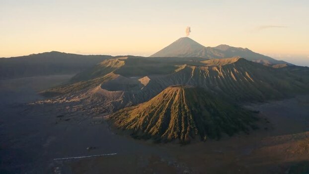 Aerial view of Mount Bromo and volcanic craters at sunrise Indonesia. Aerial view of Mount Bromo and volcanic craters at sunrise Indonesia.