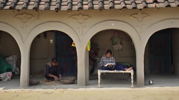 View of people at a traditional house in Dhangadhi Nepal. View of people at a traditional house in Dhangadhi Nepal.