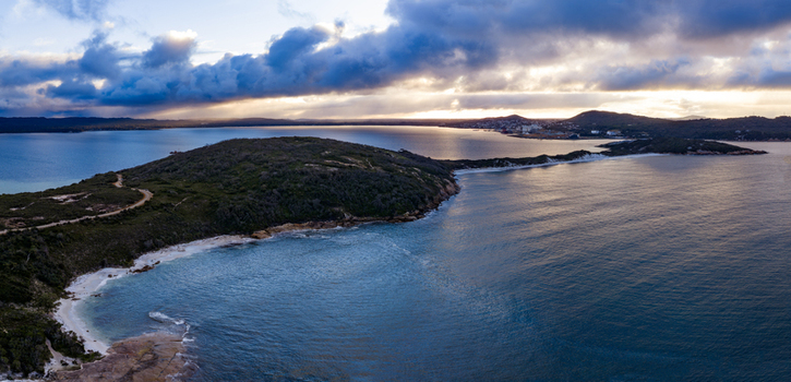 Aerial view of Quaranup Beach on the Vancouver Peninsula featuring rugged coastline sandy shores and calm blue waters in Vancouver Peninsula Western Australia Australia.