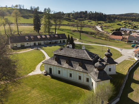 Aerial view of the historic Kastiel Kubinyi manor house with its traditional shingle roof and surrounding green gardens Vysny Kubin Zilinsky kraj Slovakia. Aerial view of the historic Kastiel Kubinyi manor house with its traditional shingle roof and surrounding green gardens Vysny Kubin Zilinsky kraj Slovakia.