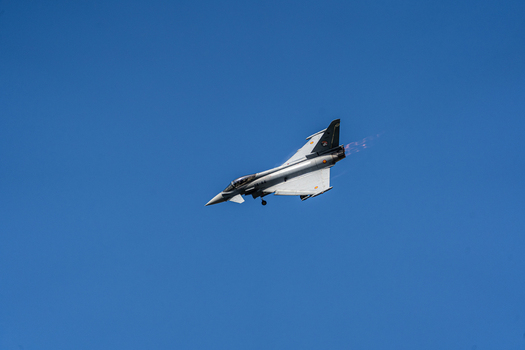 Berlin Germany 13 June 2026 View of a Eurofighter Typhoon jet performing a flight display at the ILA Berlin Air Show against a clear blue sky. Berlin Germany 13 June 2026 View of a Eurofighter Typhoon jet performing a flight display at the ILA Berlin Air Show against a clear blue sky.