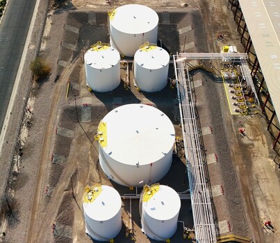 Grand Junction Colorado United States 03 July 2026 Aerial view of industrial storage tanks arranged in a facility with connecting pipes and gravel ground. Grand Junction Colorado United States 03 July 2026 Aerial view of industrial storage tanks arranged in a facility with connecting pipes and gravel ground.