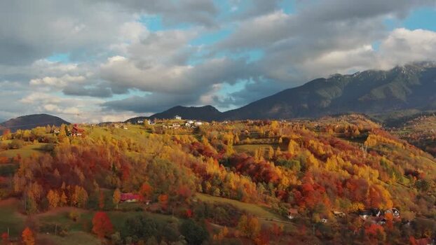 Aerial view of autumn forests and hills in Transylvania Romania.