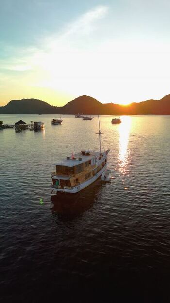 Aerial view of boats at sunset in Komodo National Park Indonesia. Aerial view of boats at sunset in Komodo National Park Indonesia.