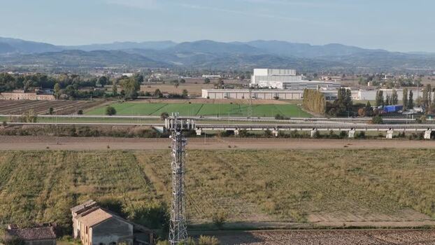 Aerial view of telecommunications tower near A1 motorway Italy. Aerial view of telecommunications tower near A1 motorway Italy.