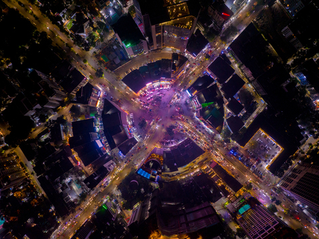 Aerial view of a bustling roundabout illuminated with vibrant lights capturing the city s energy at night Dhaka Dhaka Division Bangladesh. Aerial view of a bustling roundabout illuminated with vibrant lights capturing the city s energy at night Dhaka Dhaka Division Bangladesh.