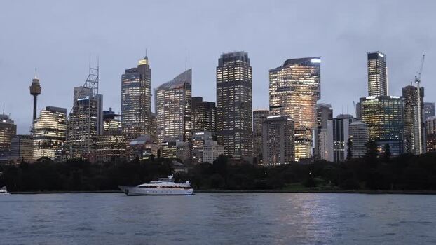 View of Sydney skyline and harbor at dusk Australia.