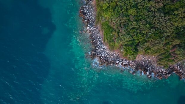 Aerial view of rocky coastline and turquoise sea Albania.