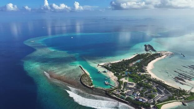 Aerial view of a tropical resort with turquoise lagoons Maldives. Aerial view of a tropical resort with turquoise lagoons Maldives.