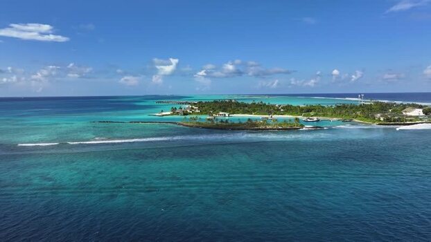 Aerial view of tropical resort with turquoise lagoons Maldives. Aerial view of tropical resort with turquoise lagoons Maldives.