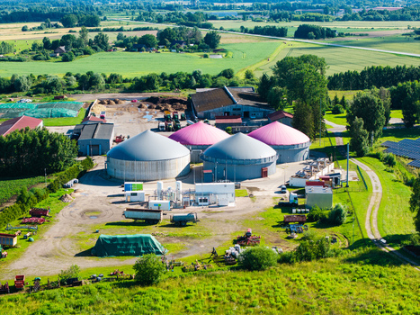 Iecava Latvia 05 July 2026 Aerial view of the biogas production station with large circular storage tanks industrial buildings and agricultural equipment in a rural landscape. Iecava Latvia 05 July 2026 Aerial view of the biogas production station with large circular storage tanks industrial buildings and agricultural equipment in a rural landscape.
