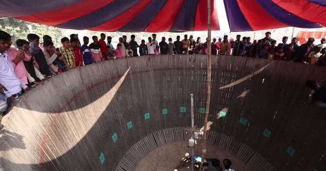 View of the Well of Death stunt arena with a crowd Bangladesh.