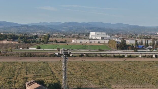 Aerial view of tower near A1 and A21 motorways Italy. Aerial view of tower near A1 and A21 motorways Italy.