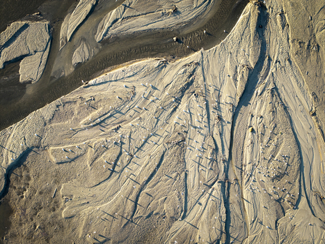 Aerial view of the intricate sandy patterns and river channels of Lake Czorsztynskie Nowy Targ County Lesser Poland Voivode Poland. Aerial view of the intricate sandy patterns and river channels of Lake Czorsztynskie Nowy Targ County Lesser Poland Voivode Poland.