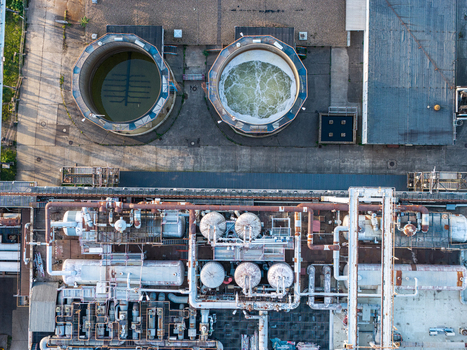 Aerial view of Heizkraftwerk Klingenberg combined heat and power plant with industrial piping large circular tanks and complex machinery in Berlin Berlin Germany. Aerial view of Heizkraftwerk Klingenberg combined heat and power plant with industrial piping large circular tanks and complex machinery in Berlin Berlin Germany.
