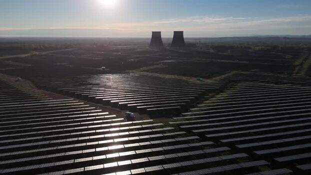 Aerial view of solar park and towers Italy.