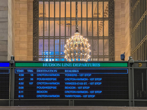 New York United States 14 May 2026 View of the Hudson Line departures board at Grand Central Terminal with an ornate chandelier and large arched window. New York United States 14 May 2026 View of the Hudson Line departures board at Grand Central Terminal with an ornate chandelier and large arched window.