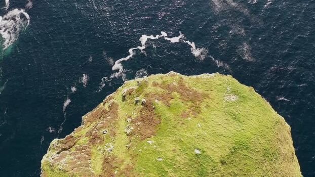 Aerial view of Glenlough Bay cliffs above the Atlantic Ireland.