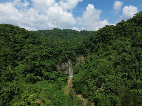 Aerial view of the waterfall in the lush green forest of Sitakund Chittagong Division Bangladesh. Aerial view of the waterfall in the lush green forest of Sitakund Chittagong Division Bangladesh.