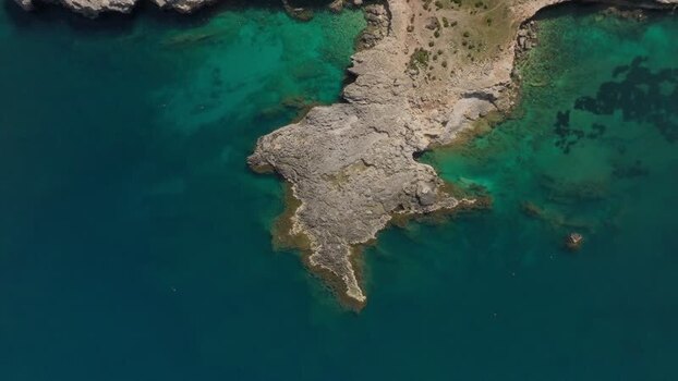 Aerial view of the rocky coastline of Plemmirio Italy.