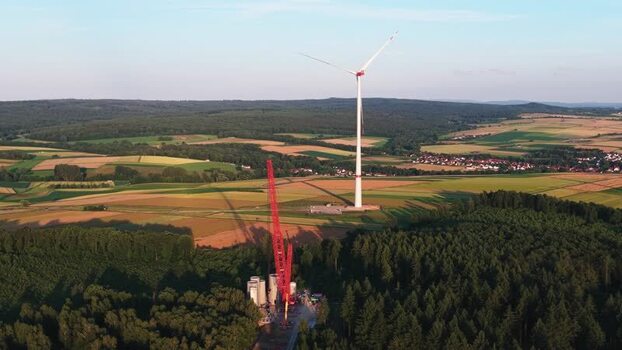 Aerial view of wind turbine construction in rural Germany. Aerial view of wind turbine construction in rural Germany.