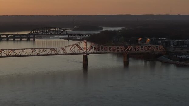 Aerial view of bridges over the Ohio River at sunset United States. Aerial view of bridges over the Ohio River at sunset United States.