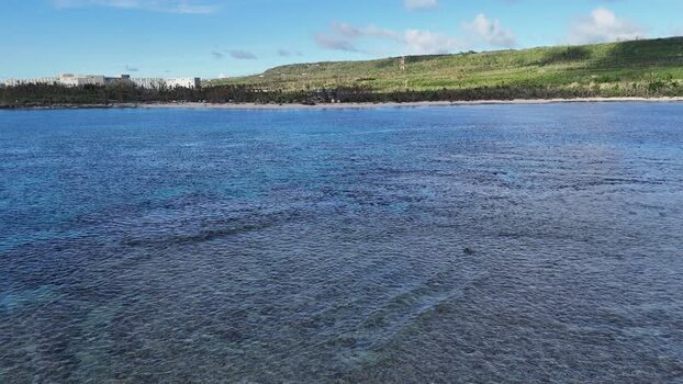 Aerial view of Taga Beach and coral reefs Northern Mariana Islands.