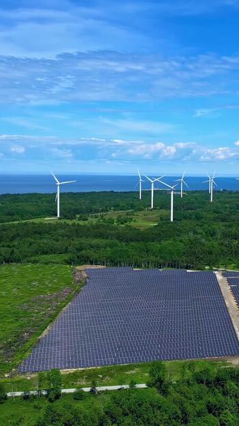 Aerial view of solar farm and wind turbines in Tallinn Estonia. Aerial view of solar farm and wind turbines in Tallinn Estonia.
