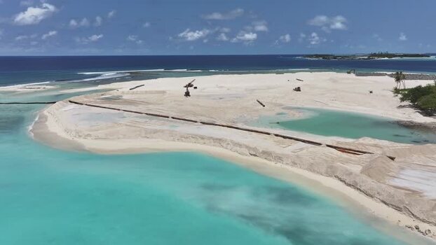 Aerial view of beach construction and land reclamation Maldives. Aerial view of beach construction and land reclamation Maldives.