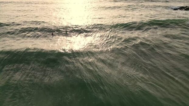 Aerial view of surfers at Praia da Mata Portugal. Aerial view of surfers at Praia da Mata Portugal.