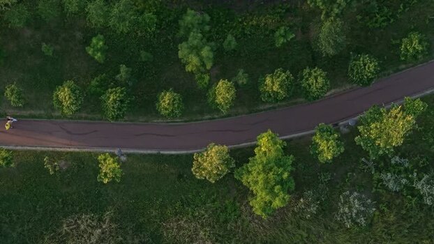 Aerial view of a winding path through a green park Albania. Aerial view of a winding path through a green park Albania.