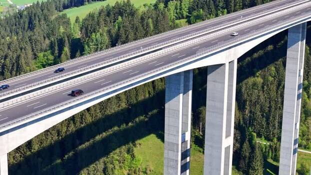 Aerial view of the Lavanttal bridge spanning a lush valley Austria. Aerial view of the Lavanttal bridge spanning a lush valley Austria.
