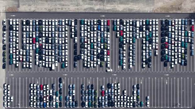 Aerial view of cars in parking lot France.