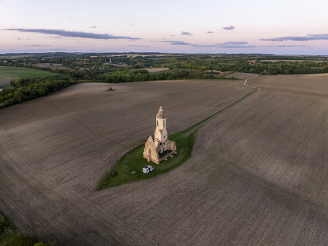 Aerial view of Pusztatorony the historic ruins of a medieval church standing in the middle of vast agricultural fields near Somogyvamos Hungary. Aerial view of Pusztatorony the historic ruins of a medieval church standing in the middle of vast agricultural fields near Somogyvamos Hungary.