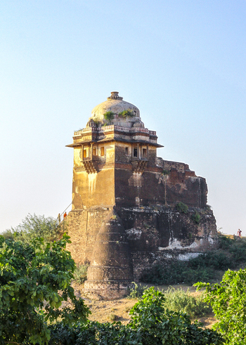 View of the historic Rohtas Fort with its weathered stone walls domed structure and surrounding greenery in Dina Punjab Pakistan. View of the historic Rohtas Fort with its weathered stone walls domed structure and surrounding greenery in Dina Punjab Pakistan.