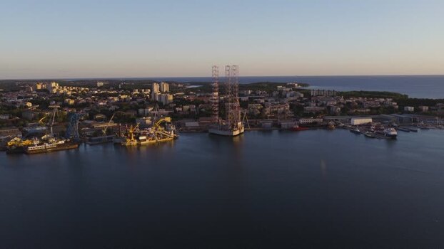 Aerial view of Pula shipyard and harbor at sunset Croatia. Aerial view of Pula shipyard and harbor at sunset Croatia.