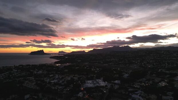 Aerial view of Moraira coastline at sunset Spain.