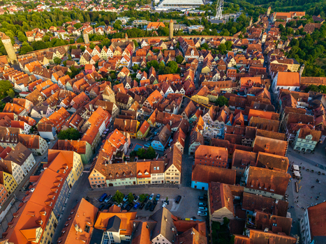 Aerial view of the historic town with iconic red tiled rooftops medieval architecture and winding streets in Rothenburg ob der Tauber Bavaria Germany. Aerial view of the historic town with iconic red tiled rooftops medieval architecture and winding streets in Rothenburg ob der Tauber Bavaria Germany.