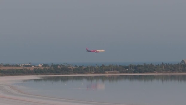 Aerial view of airplane over Larnaca Salt Lake Cyprus.