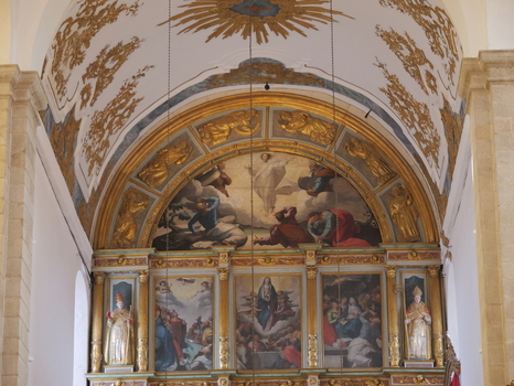 View of the ornate gilded altar and religious paintings inside the Se de Portalegre in Portalegre Portalegre District Portugal.