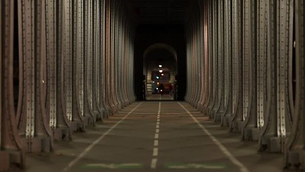 View of the steel colonnade of Bir Hakeim Bridge at night France.