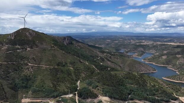 Aerial view of Barragem da Pracana and wind turbine Portugal.