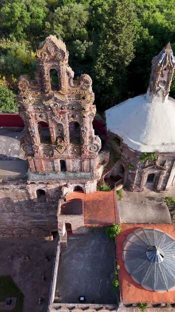 Aerial view of La Cartuja de Cazalla monastery and bell tower Spain. Aerial view of La Cartuja de Cazalla monastery and bell tower Spain.